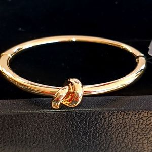 The Limited Gold Love Knot Magnetic Closure Bangle Bracelet